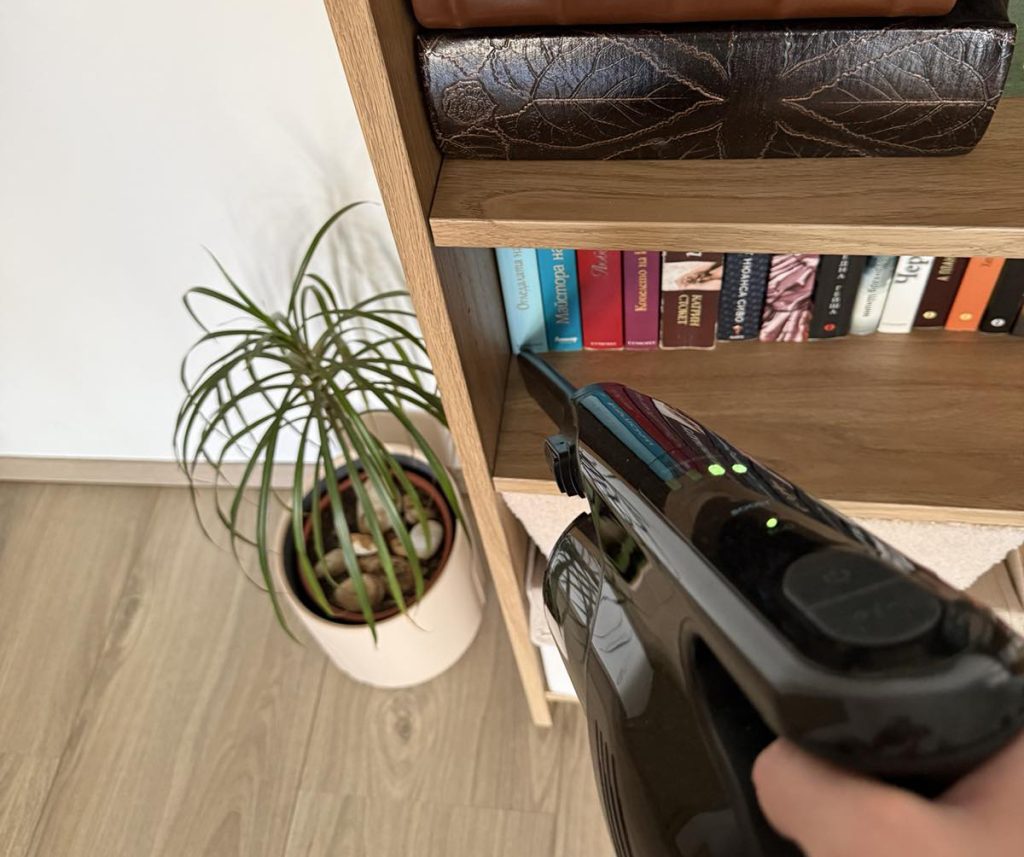 Dusting shelves during deep cleaning